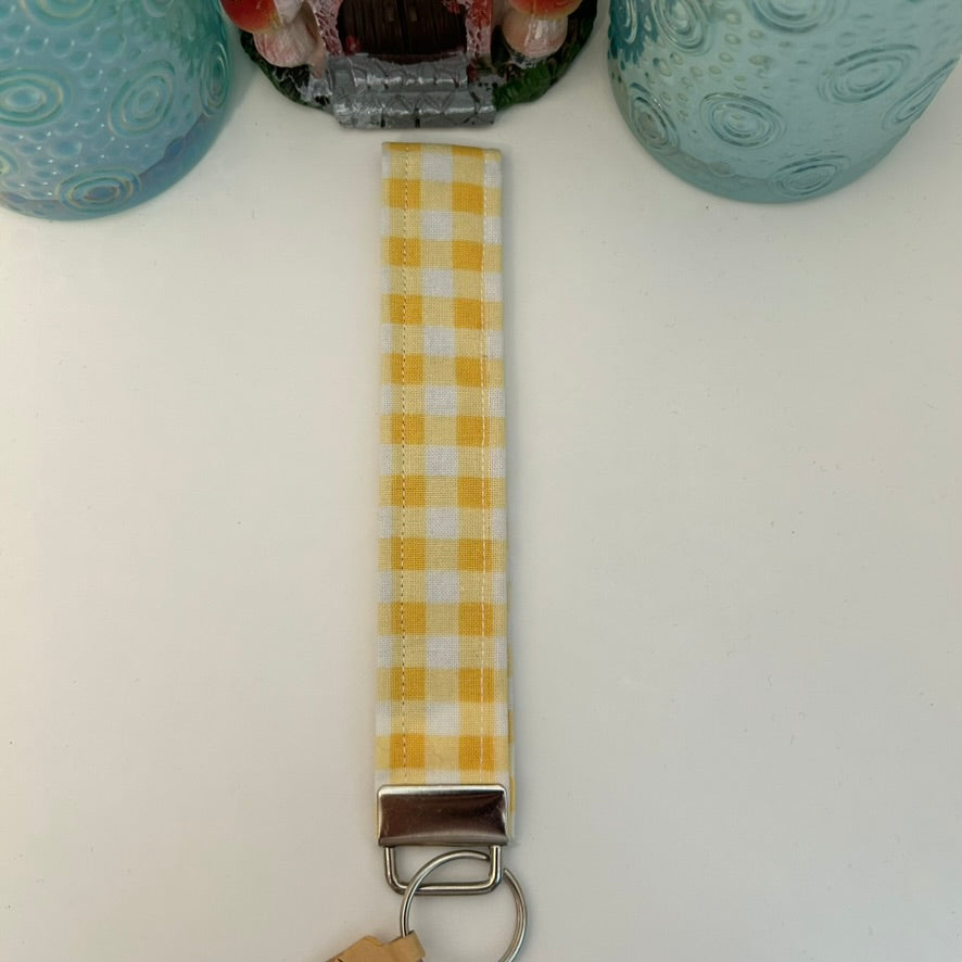 Yellow and white checkerboard keychain