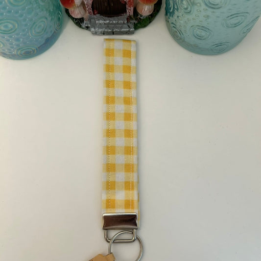Yellow and white checkerboard keychain